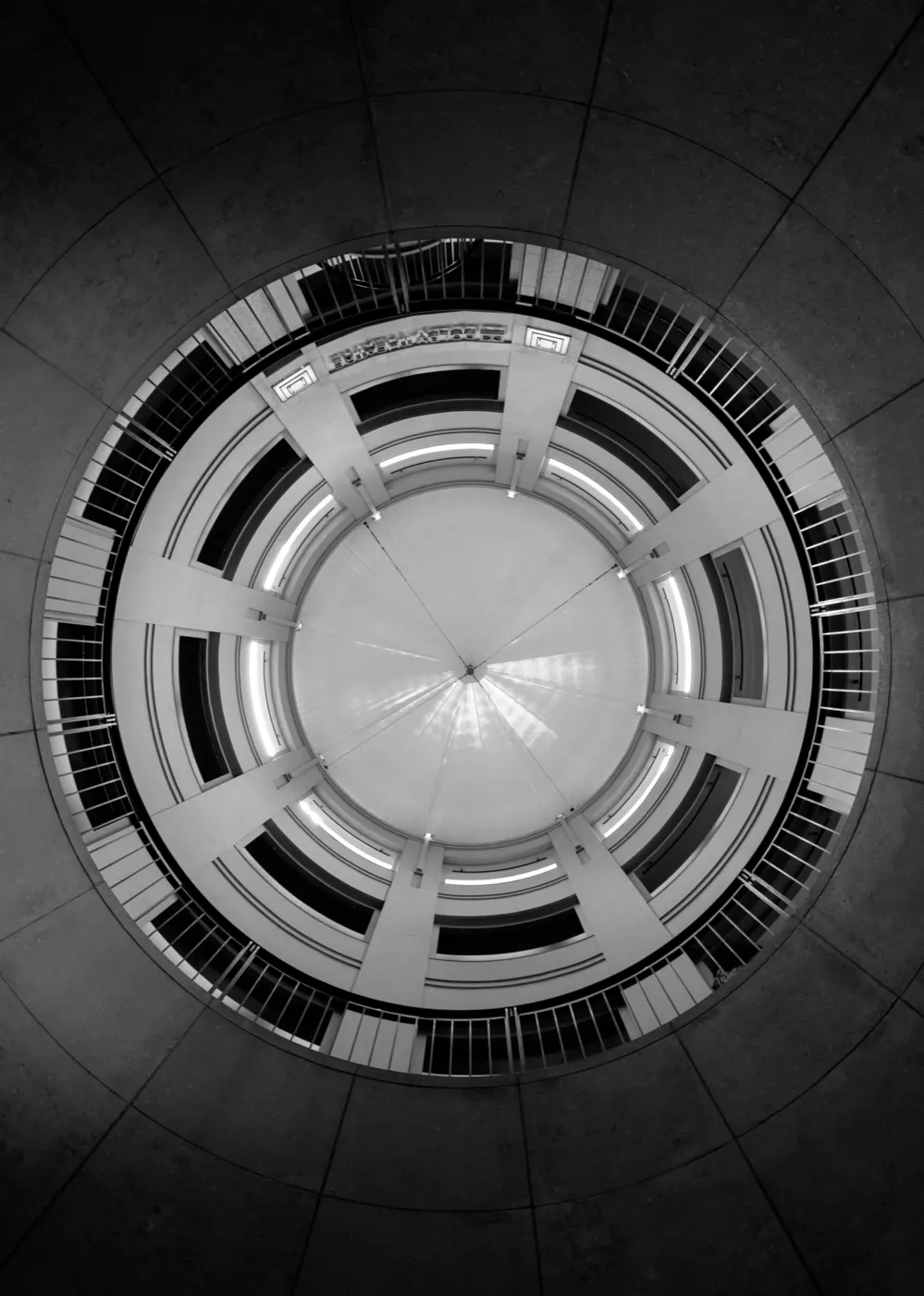 Black-and-white view of a circular building interior